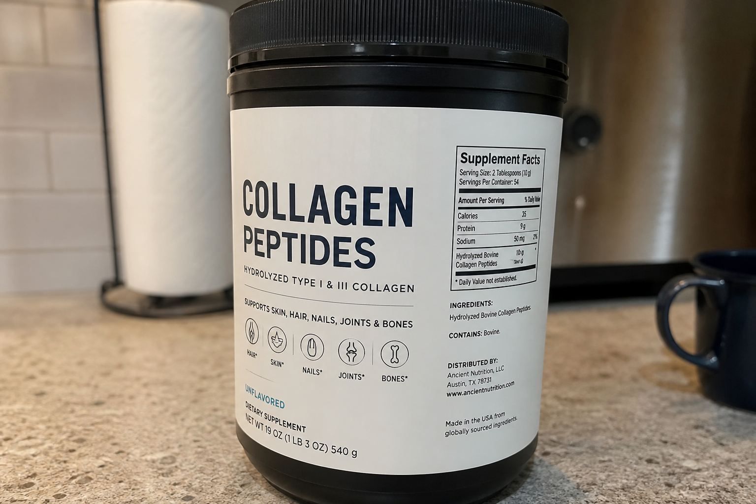 A labelled collagen peptides tub on a kitchen counter.